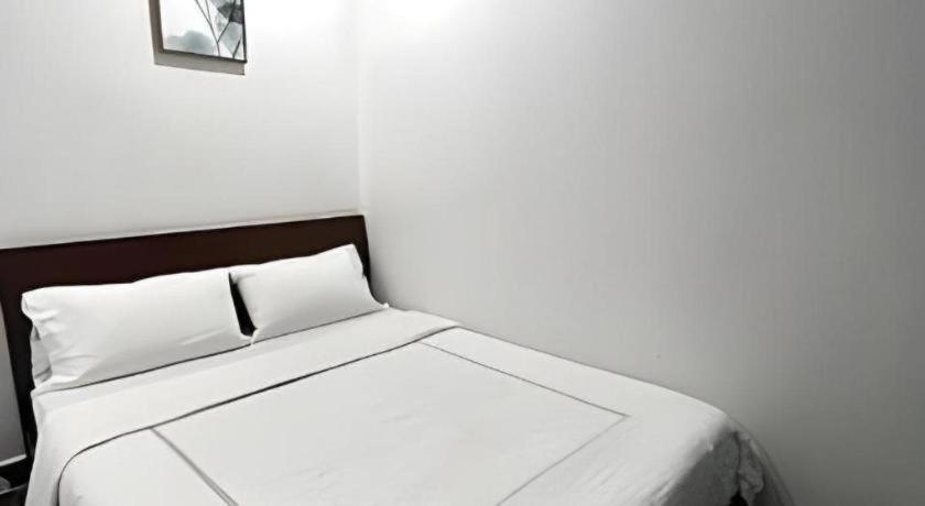 Oyo 90936 Hotel Manjoi Inn Ипох Экстерьер фото